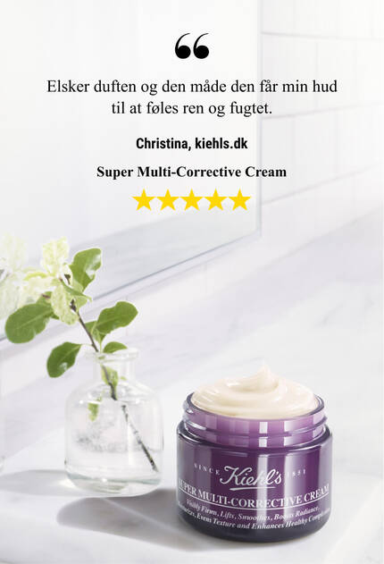 A jar of Kiehl's Super Multi-Corrective Cream on a smooth, cream-colored background, accompanied by a user testimonial praising its pleasant scent and skin-cleansing properties.