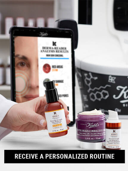 Billede af en hudplejeprodukter fra Kiehl's, herunder en serum og en creme, med en skaerm i baggrunden der viser hudanalyse resultater. Teksten opfordrer til at modtage en personlig rutine.