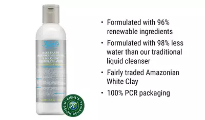 A bottle of Kiehl's Rare Earth Deep Pore-Minimizing & Polishing Powder Cleanser, featuring details about its renewable ingredients, reduced water usage, fair trade Amazonian white clay, and 100% PCR packaging.