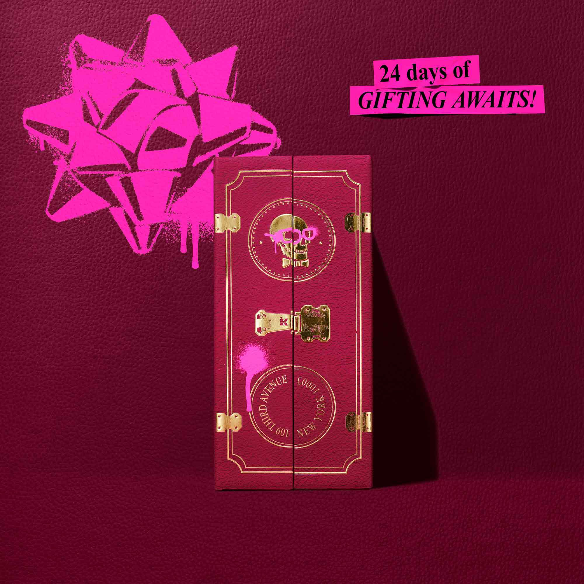 A graphic shows a purple gift box in the process of being opened, revealing three Kiehl's skincare products nestled inside on a pink, textured background. The products include a purple jar of "Kiehl's Super Multi-Corrective Cream" on the left, a white and prurple bottle of "Kiehl's Retinol Skin-Renewing Daily Micro-Dose Serum" in the center, and a smaller purple jar of "Kiehl's Super Multi-Corrective Eye Zone Treatment" on the right. A gold Christmas ornament is visible in the top right corner.