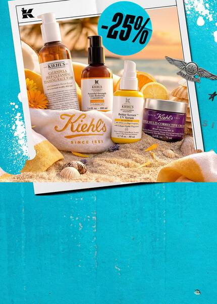 Kiehl's hudplejeprodukter, inklusive ansigtsvask, serum og creme, sat op mod en smuk solnedgang på stranden.