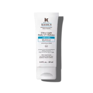 En 30 ml tube Kiehl's Ultra Light Daily UV Defense Aqua Gel mod en hvid baggrund.