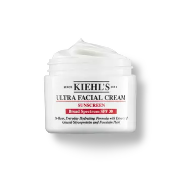 En 125 ml krukke med Kiehl's Ultra Facial Cream SPF 30 med pisket konsistens mod en hvid baggrund.