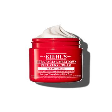 Rød krukke med Kiehl’s Ultra Facial Meltdown Recovery Cream Whip, der viser en pisket creme-konsistens.