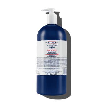 En flaske Kiehl's Body Fuel All-In-One Energizing Wash mod en hvid baggrund.