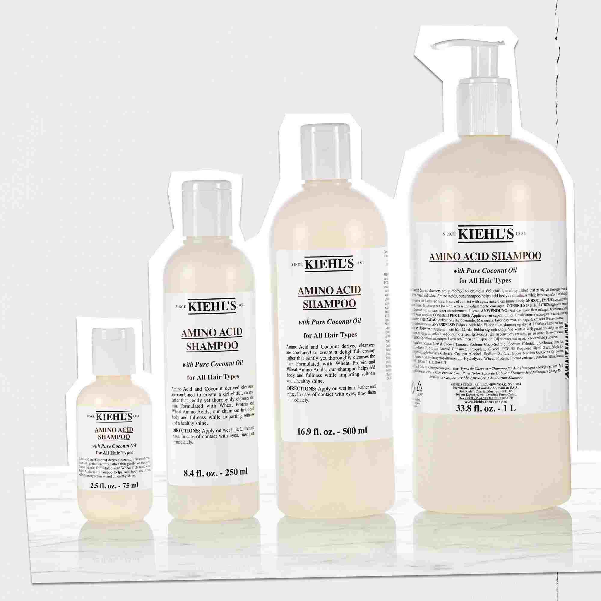 Udvalg af Kiehl's Amino Acid Shampoo-flasker i forskellige størrelser