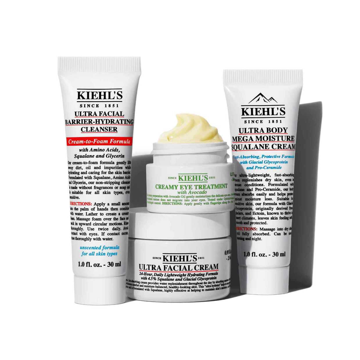Kiehl's skincare products: Ultra Facial Cream, Creamy Eye Treatment with Avocado, and Ultra Facial Barrier Hydrating Cleanser.