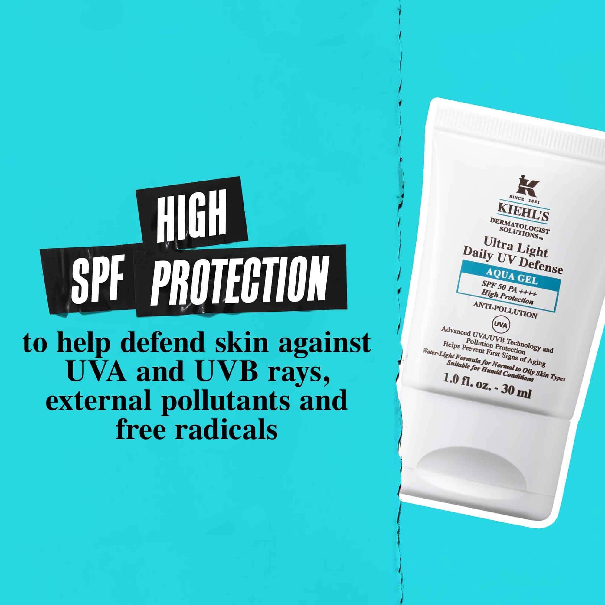 En tube Ultra Light Daily UV Defense Aqua Gel mod en blå baggrund med teksten: "Høj SPF-beskyttelse for at hjaelpe med at forsvare huden mod UVA- og UVB-stråler, eksterne forurenende stoffer og frie radikaler."
